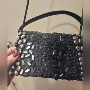 Fun BIJOUX TERNER bead embellished black hand bag.